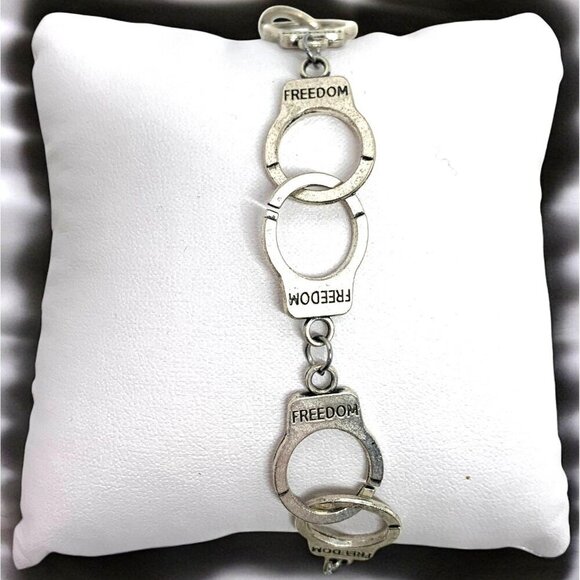 Silver Tone Handcuff Themed Freedom Charm Bracelet Toggle Clasp 8"L - Picture 1 of 4